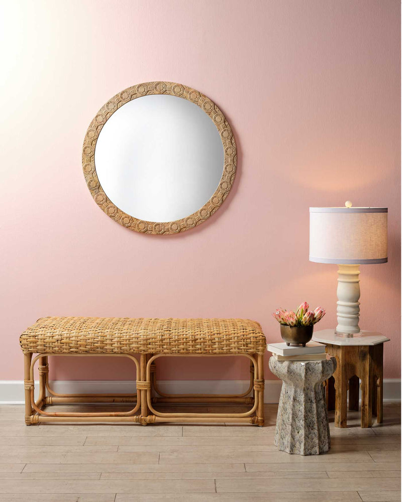 relief carved round mirror