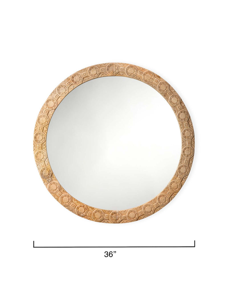 relief carved round mirror