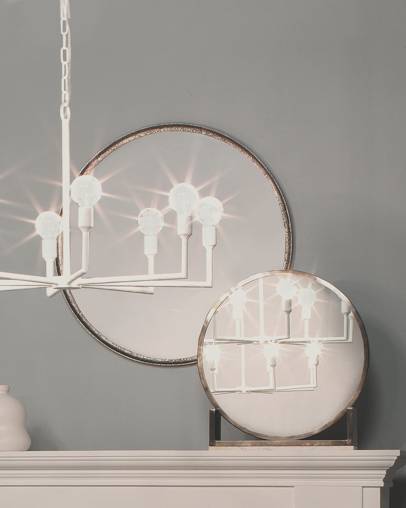 refined round mirror silver leaf