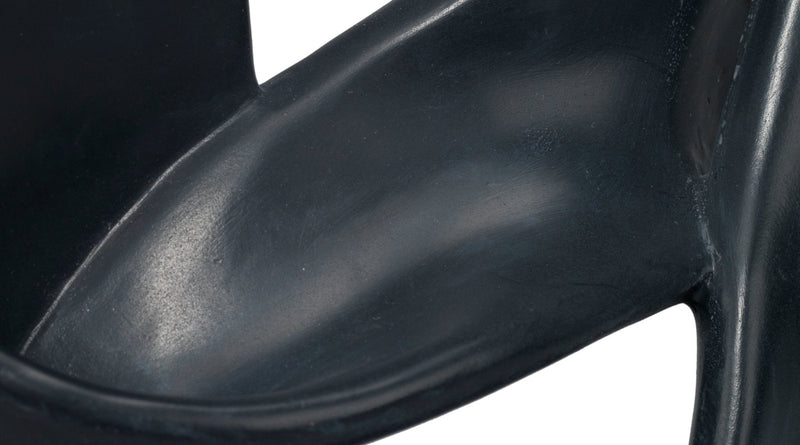 intertwined object on stand black